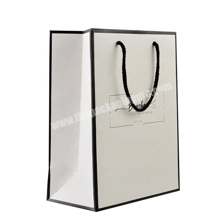 Wholesale to drawing or sample customized garment shopping paper packaging bag