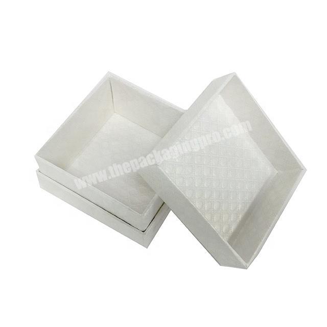custom logo cardboard pattern embossing ivory pearl paper book shape folding gift box with 4 lift off small boxes