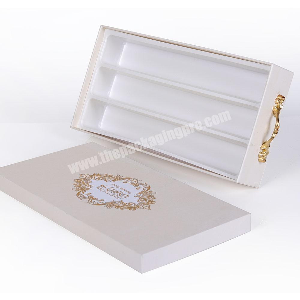luxury white color with gold hot stamping logo paper cookies box with metal handle packaging design