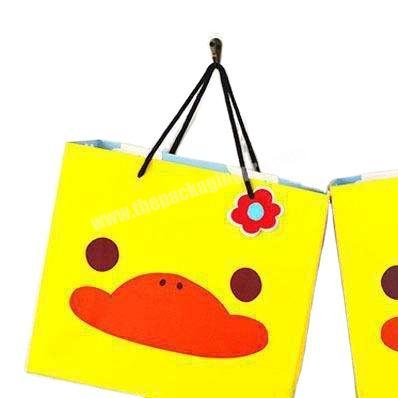factory custom cartoon pattern printed cardboard paper carry bag for toy shop