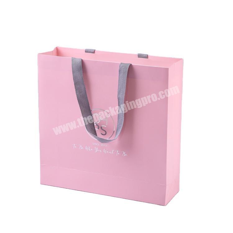 hot selling pink shopping apparel packaging t-shirt paper bags with customized logo