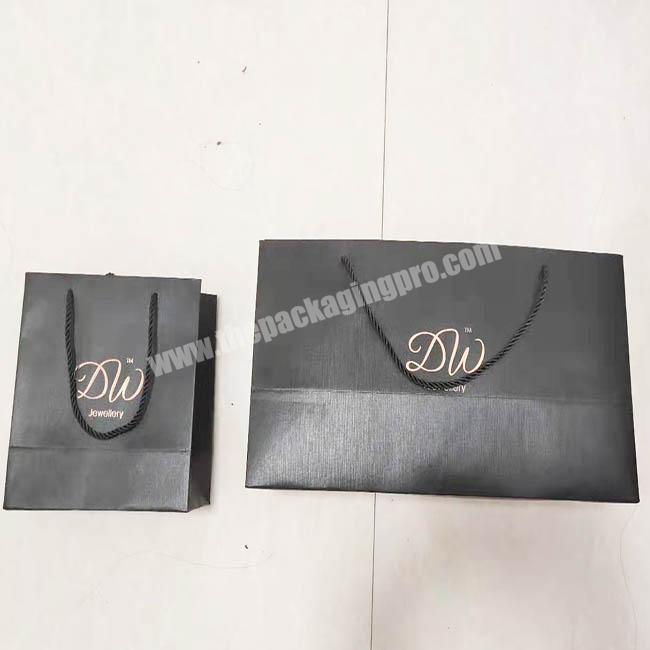 wholesale printed cheap fancy shopping jewelry packaging gift bag with rope Twisted handle Custom hot stamping logo