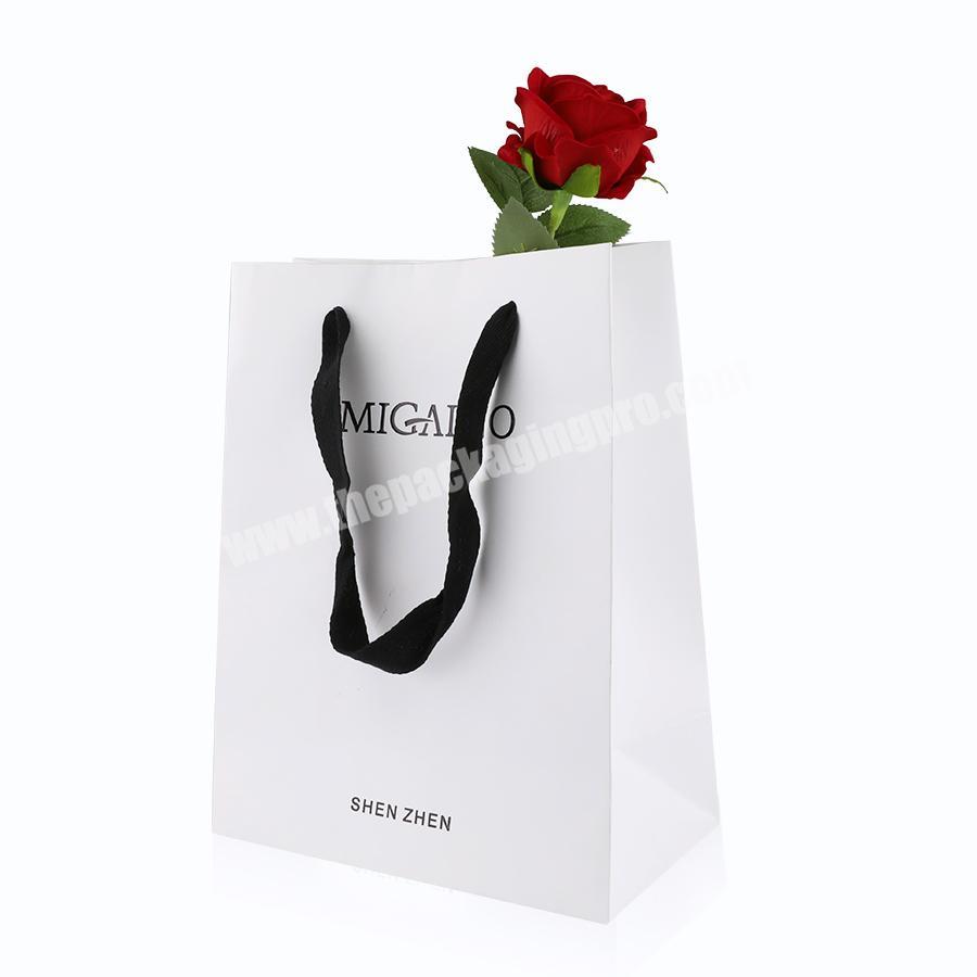 Custom kraft paper shopping gift paper bag with your own logo