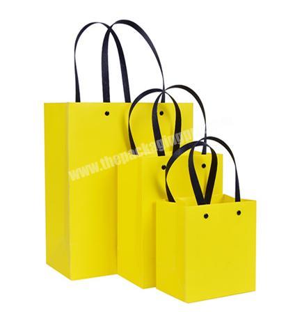Logo Marble boutique bags with design Wholesale production for packaging recyclable art paper gift bag