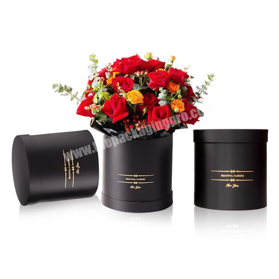 black paper flower cylinder packaging gift box tube on weeding