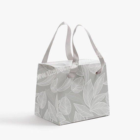 Leaf printed grey boxes with straps box bag