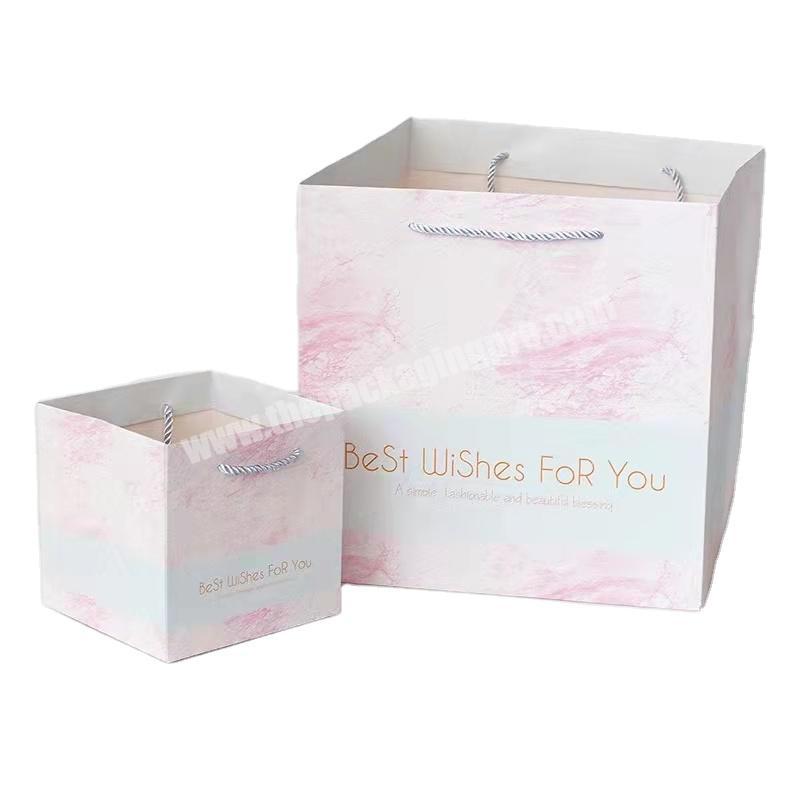 China Competitive Price Elegant Customized Brand Logo Luxury Boutique Shopping White Paper Gift Bags With Rope Handles