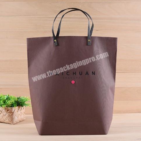 China supplier embossing luxury biodegradable chocolates color stand up paper large gift bag with plastic handle