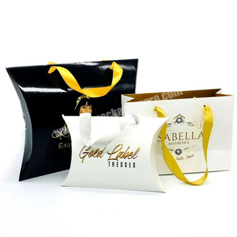 Custom bundle wig hair packaging Luxury gold stamping ribbon handle  paper pillow box and bag with your own logo