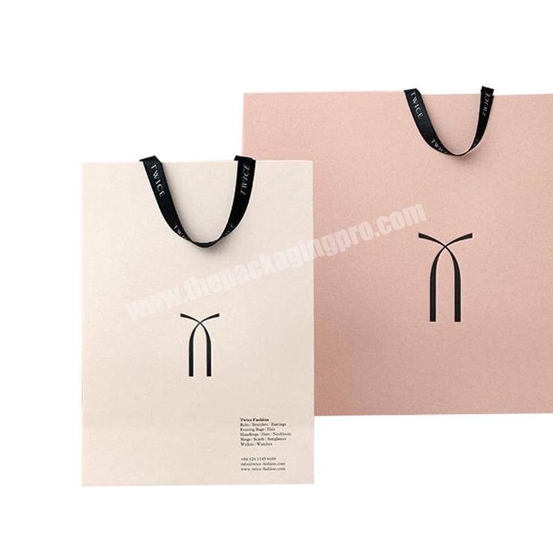Custom  printed  Glossy paper Branded Retail Shopping Paper Bags With Rope Handles