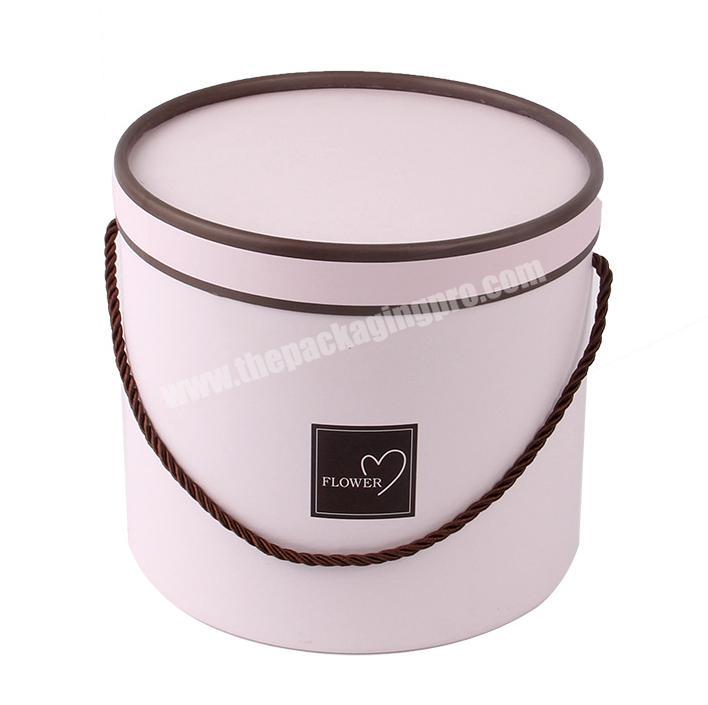 Customized wholesale high-end small gift box manufacturer custom cylinder holding bucket flower rose box with ribbon
