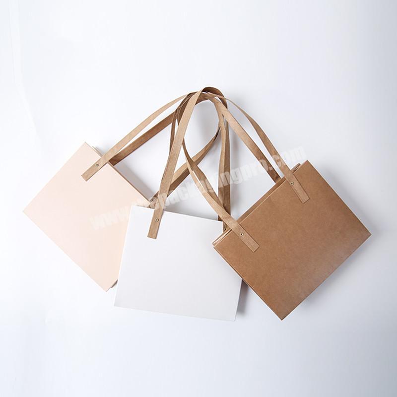 Low MOQ luxury flat handle kraft paper bag custom print color for gift