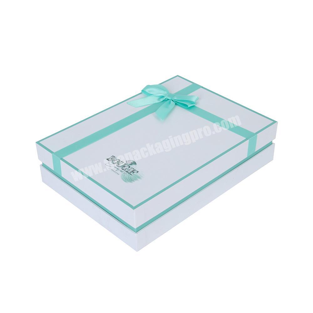 Custom white luxury boutique silk lined gift box with ribbon binding