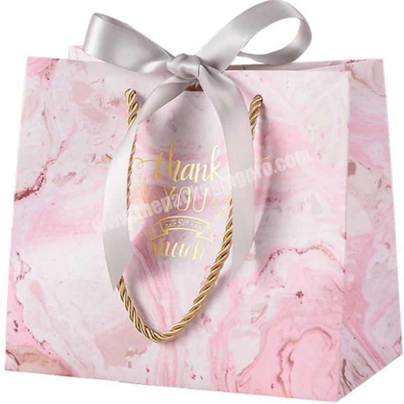 Wholesale cheap custom printing elegant small wedding favors paper packaging luxury paper bag  gift bags with ribbon