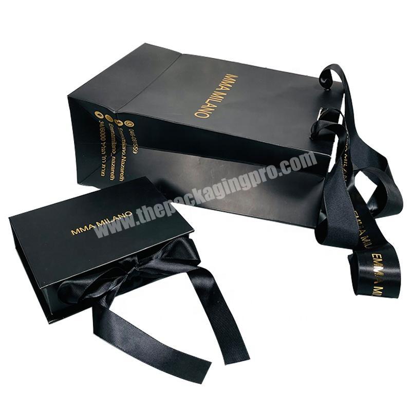 black and gold luxury cosmetic jewelry gift packaging cardboard box with ribbon and paper shopping bag