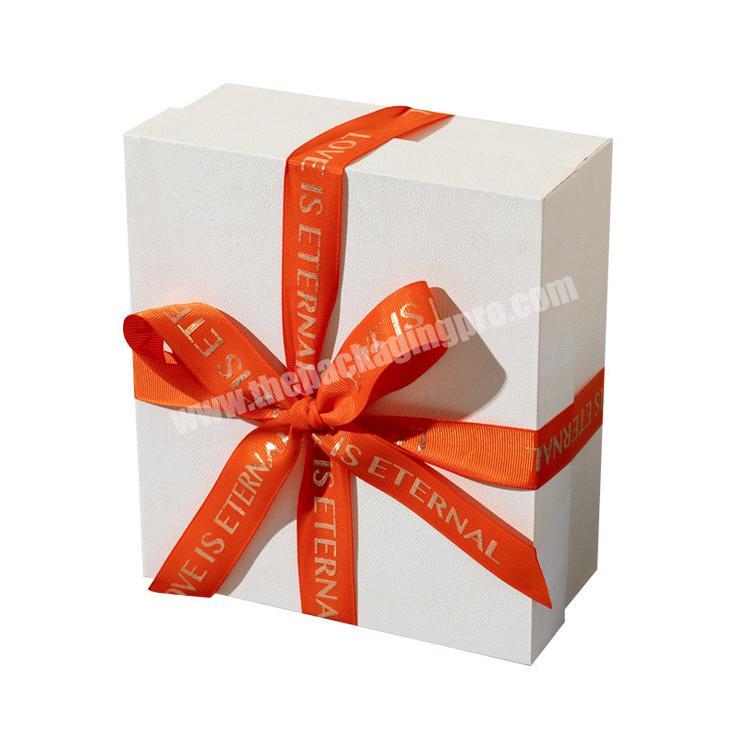 paper packaging with ribbon white gift box