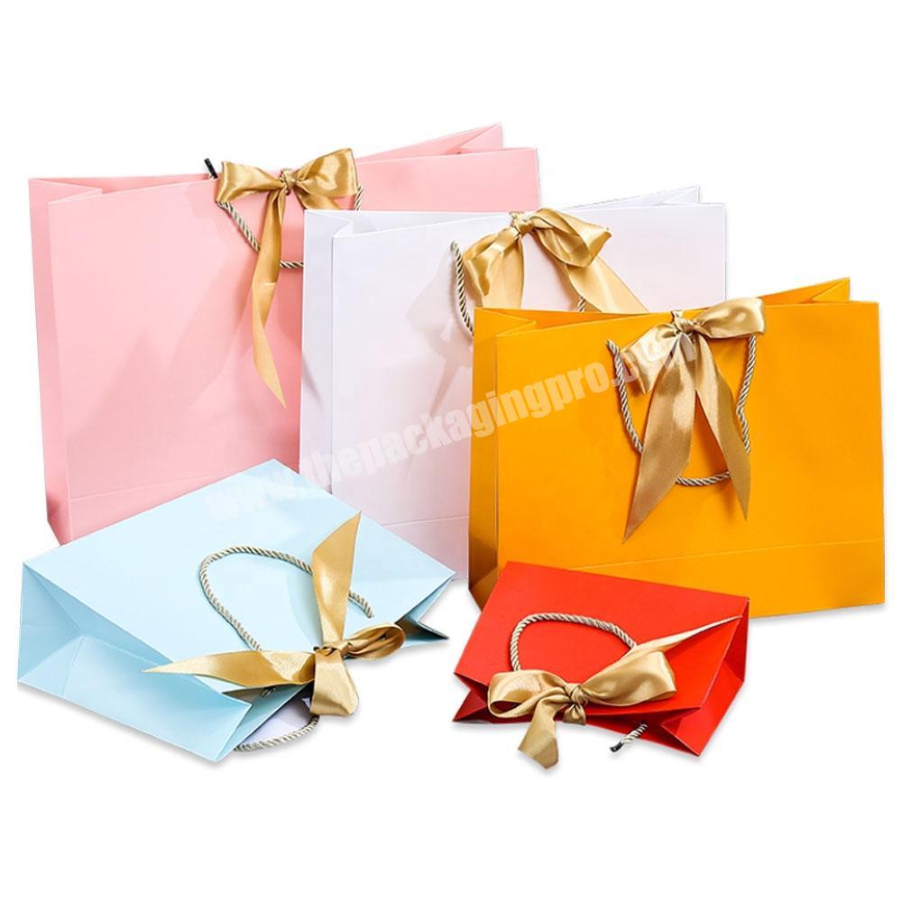 unique personalised small shopping bag for gift package custom printing pink ribbon kraft paper favor bags with logos