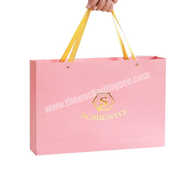 wholesale luxury paper logo shopping bags paper packaging with gold foil