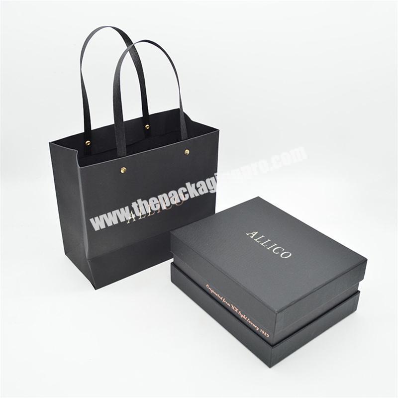 Customized logo luxury black card design eco friendly shopping thick paper bags festival promotion with gold foil stamping logo