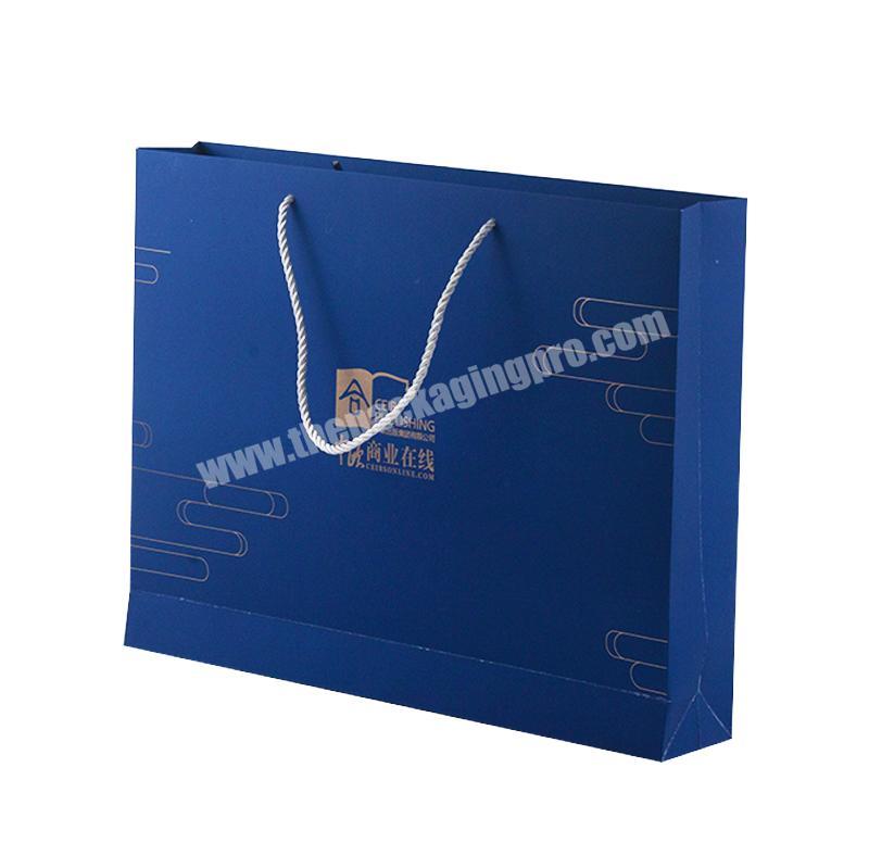 Cardboard paper handbag with custom logo durable bag for products packaging gift packing bag with ribbon handles luxury