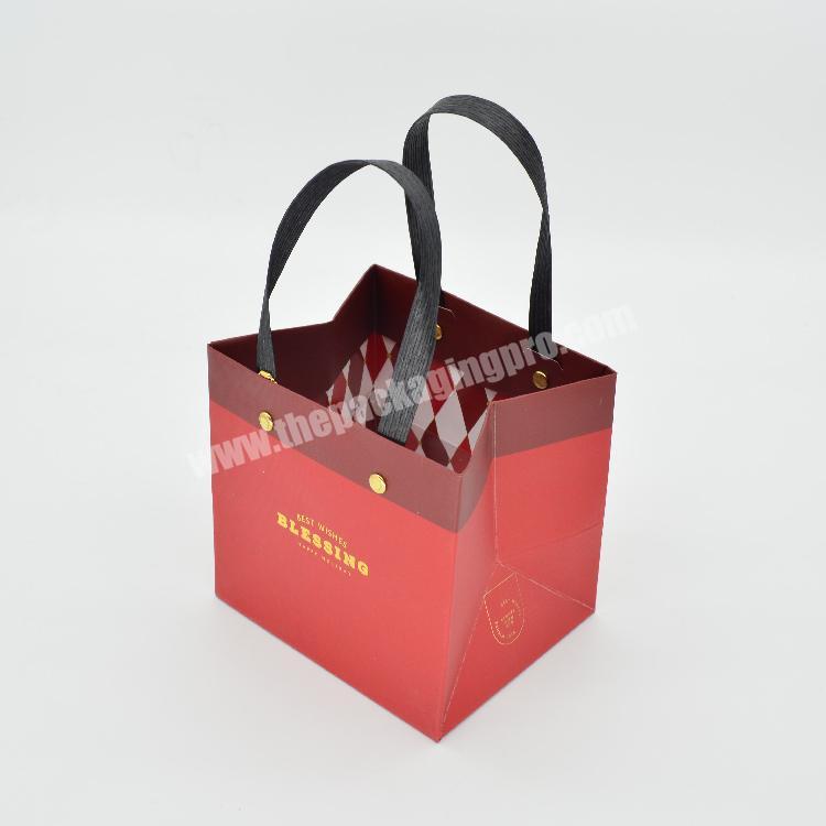 China manufacturers custom logo gift package small packaging packing new year paper bags wholesale