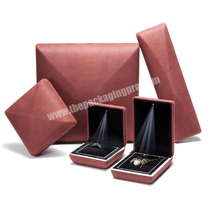 Custom Logo Hot Sale Round Angle LED Light Jewelry Packaging Box Pu Leather Ring Necklace Pendant Packaging light Box