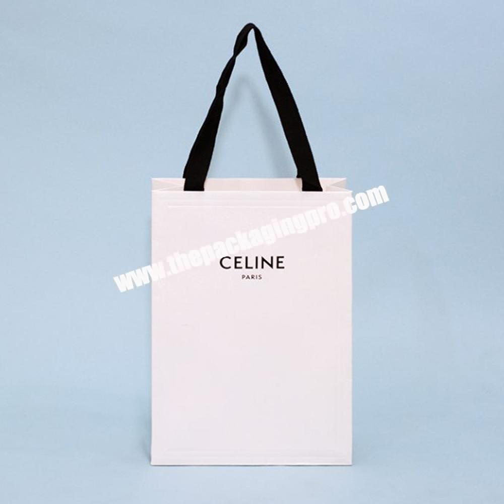 Custom Logo Luxury White Paper Apparel Packaging Promotional Gift Shopping Bag Paperbag For Clothes
