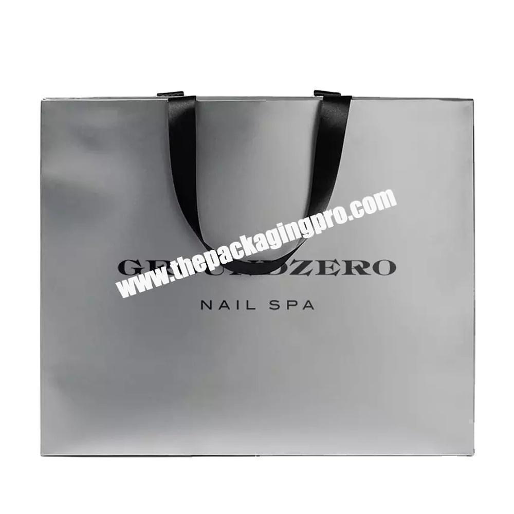 Custom Logo Printed Luxury Silver Handle Paper Jewellery Cloth Packaging Gift Shopping Bag