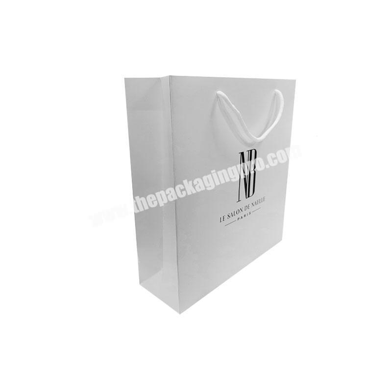 Custom lamination logo printing waterproof white gift paper bags with handle