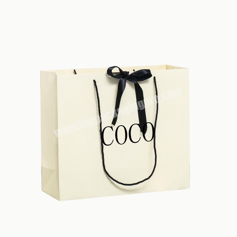 Custom own logo printed small retail boutique shopping ribbon handle Clothing packaging luxury gift skincare jewelry paper bags