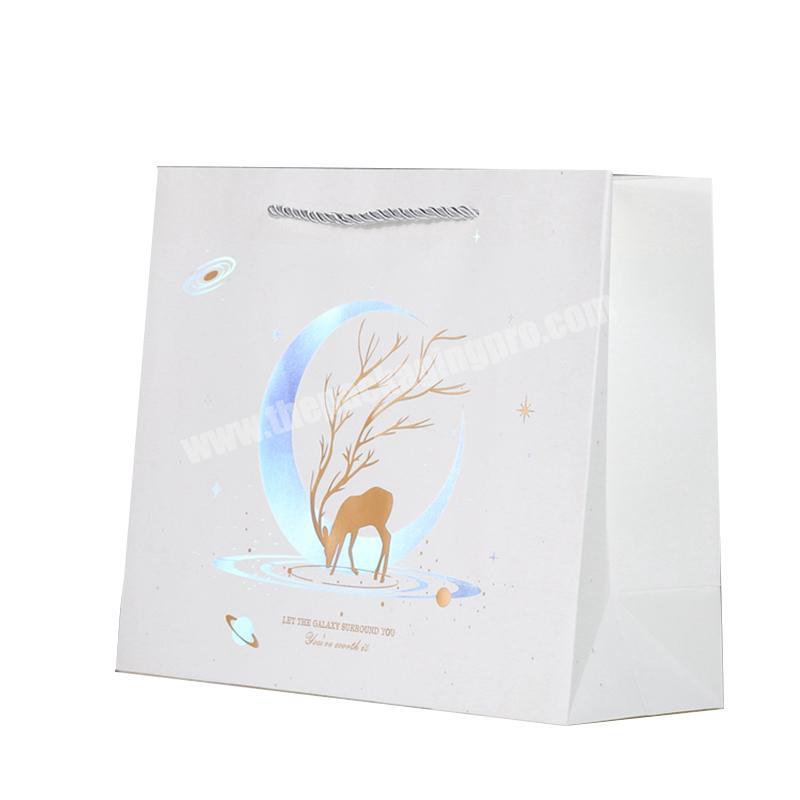 Free design bag kraft paper wholesale white kraft paper bags for clothes