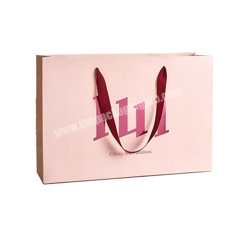 Free design wholesale custom print logo Pink Simple paper bags with logo ribbon handle