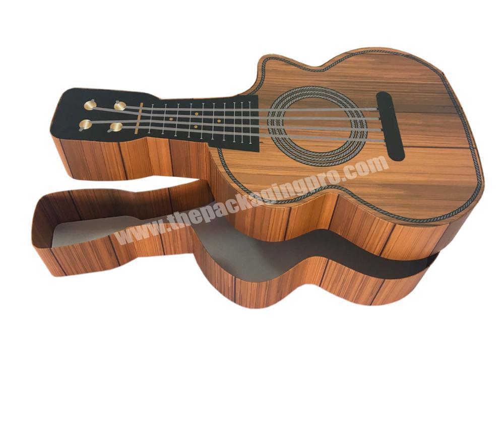 Guitar shaped paper cardboard chocolate gift box with empty base