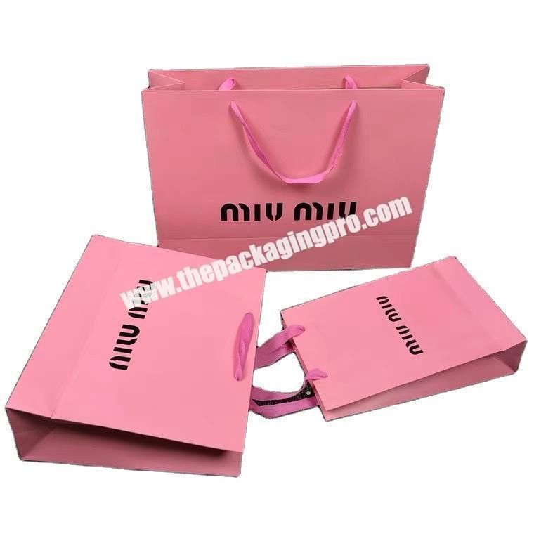High-grade embossed clothing store gift bag portable shopping paper bag custom logo shopping bags for boutique