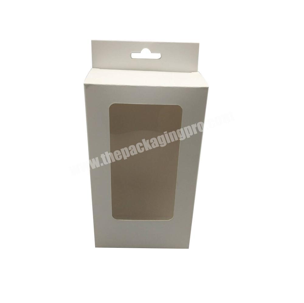 Paper packaging box with hang hole