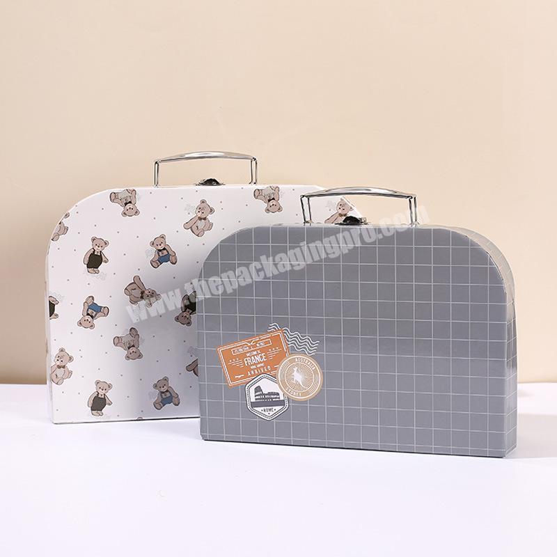 Special shaped portable paper packaging box creative flip lock curved cardboard children's toy storage hard box with handle