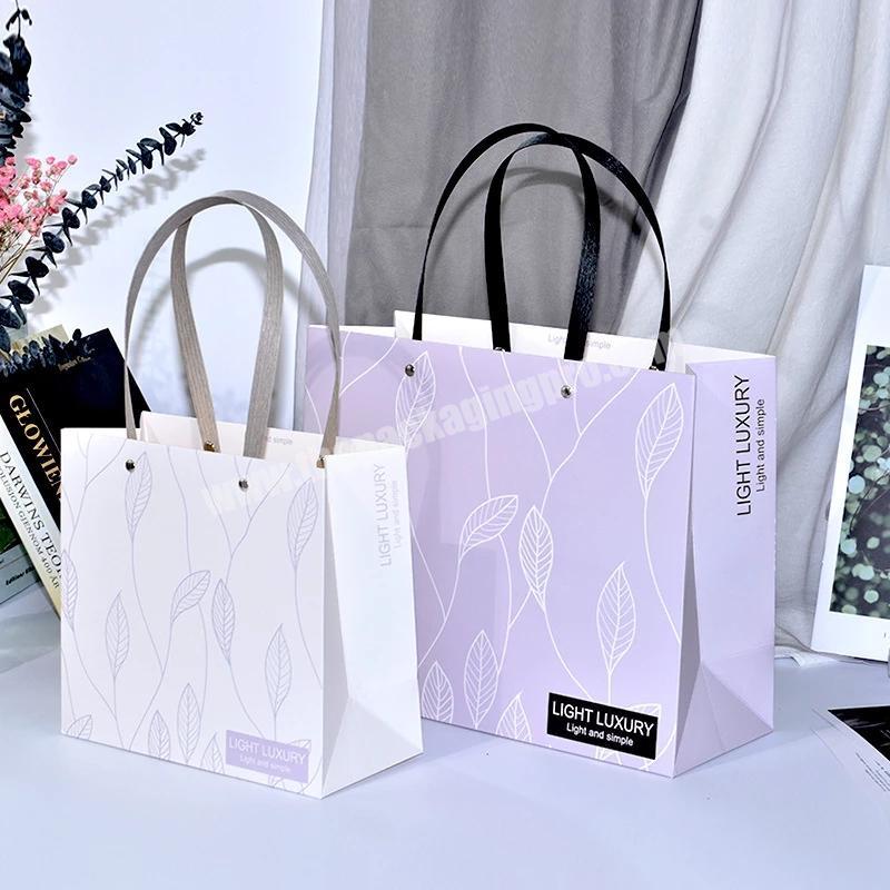 Wholesale printed cheap paper bag high quality gift custom printed paper bags fashion white clothes paper bags