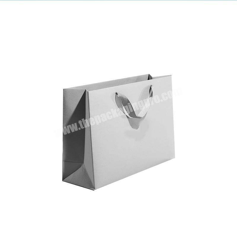 china luxury wholesale branded shopping paper bags clear clothes paper bag