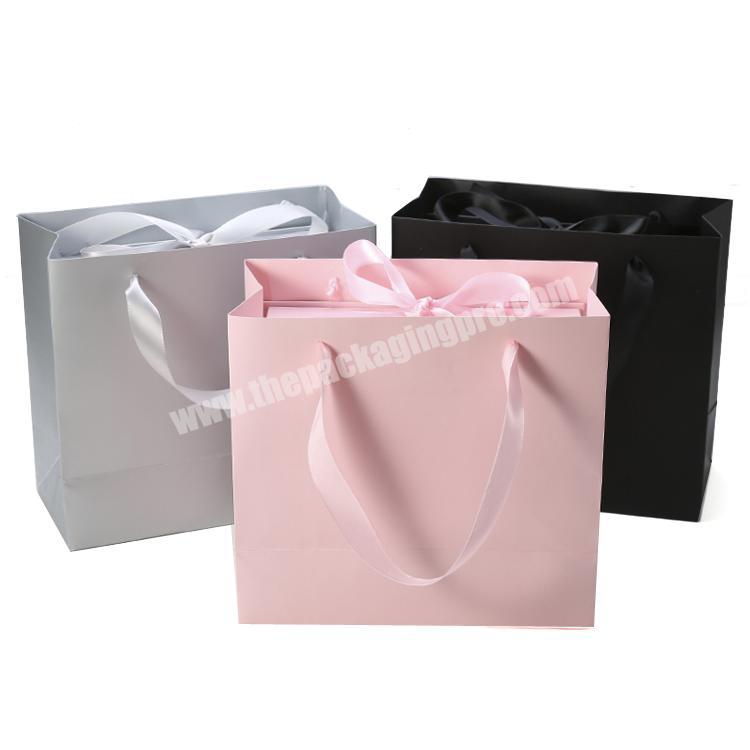 china wholesale logo design online retail store shopping twist paper kraft bag