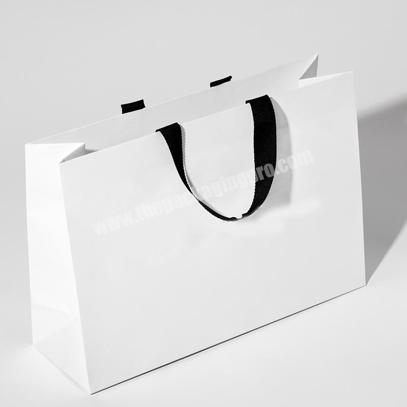 china wholesale luxury Shopping Paper Bags clear white clothes paper bag