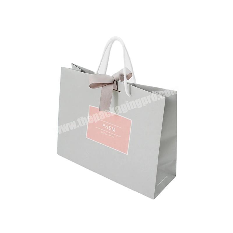 china wholesale luxury Valentine's Day paper gift bag with pink bow