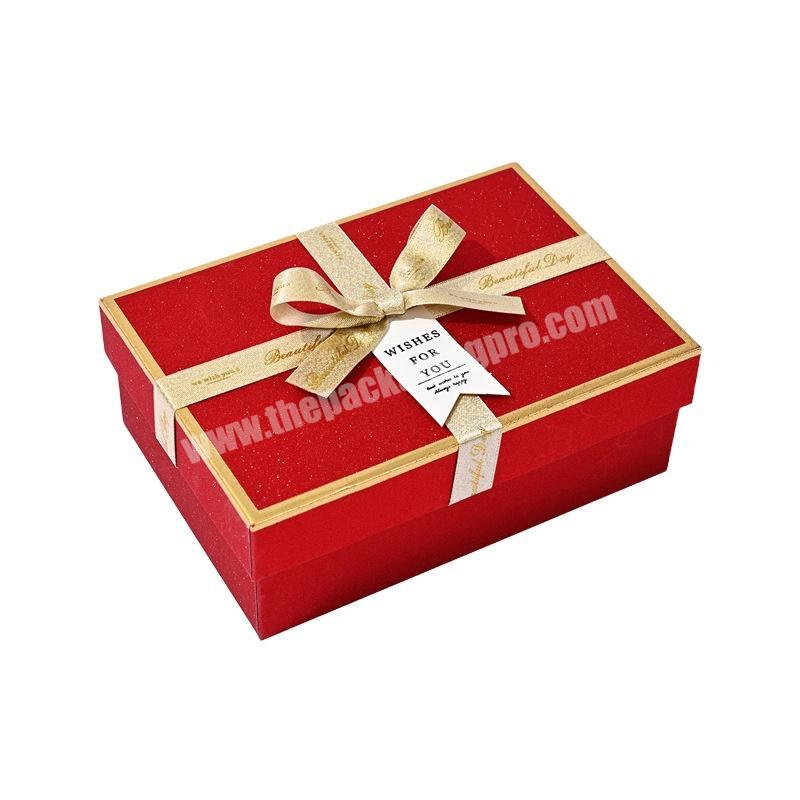 Amazon custom logo printing soft touch textured paper red heaven and earth cover cardboard gift wrapping box with bow