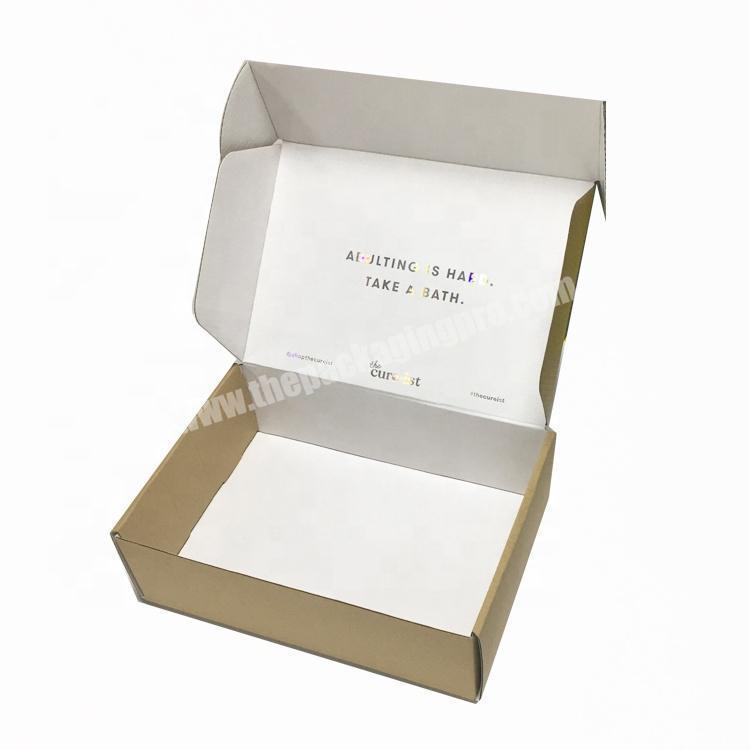 Brown paper packing box corrugated custom shipping box inside with silver hot stamping logo