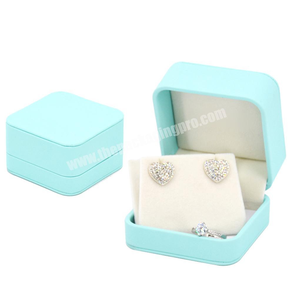 Custom design wedding ring packaging pe film jewelry packaging box with logo jewelry boxes sets luxury cotton filled jewelry box