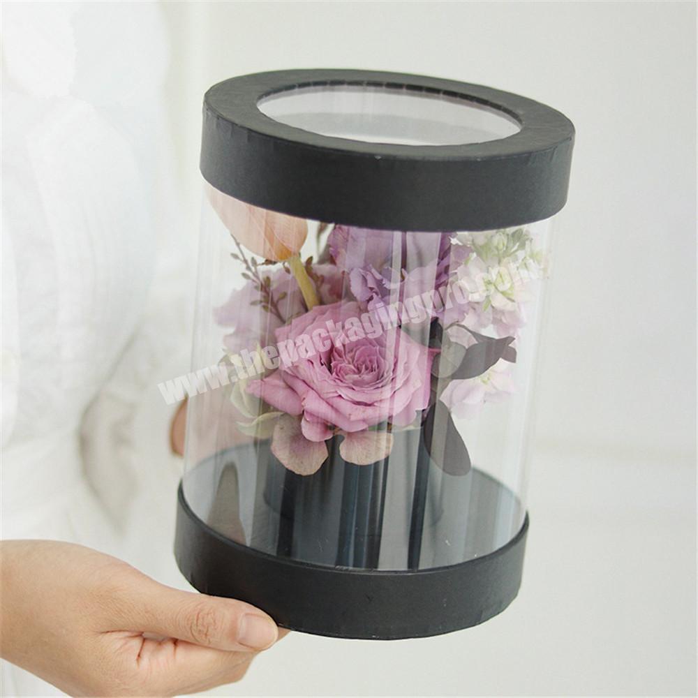 Custom luxury transparent clear PVC rose gift box round paper flower display packaging box with  logo hand holding transparent f