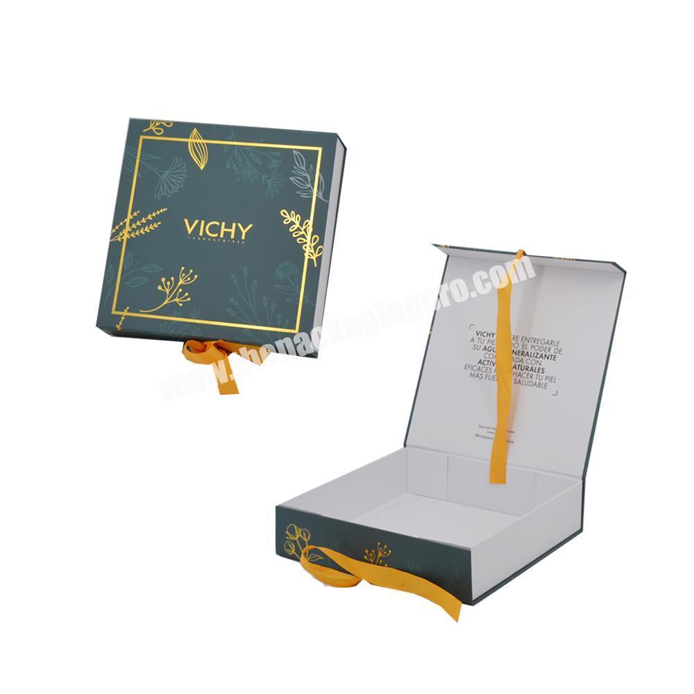Custom printing shiny logo kraft foldable small clothing gift packaging box luxury magnetic gift box with ribbon