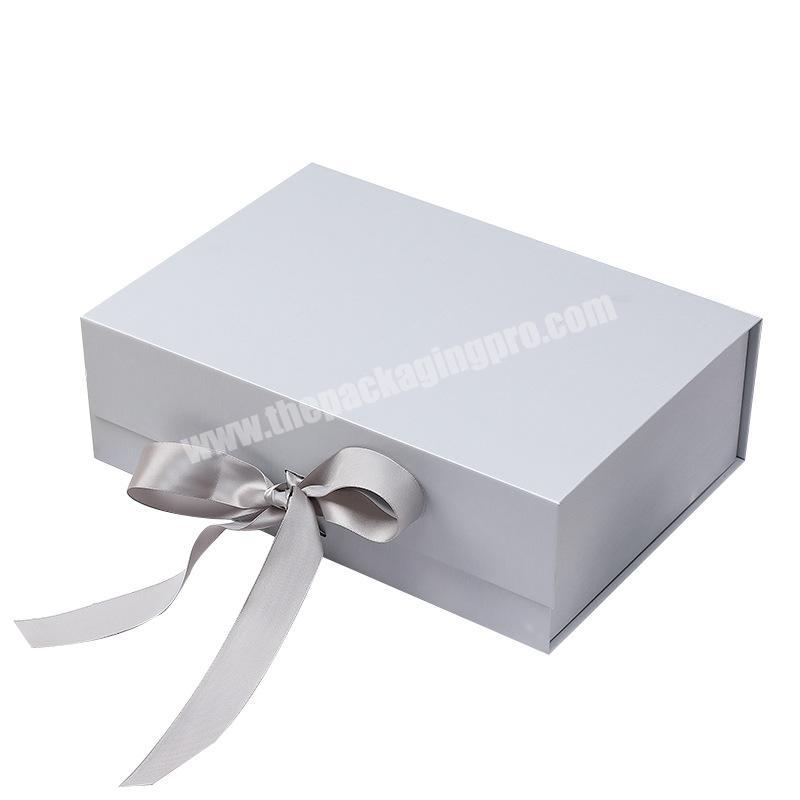 Deluxe black book shaped hard cardboard folding gift box custom printed paper magnetic flip gift box