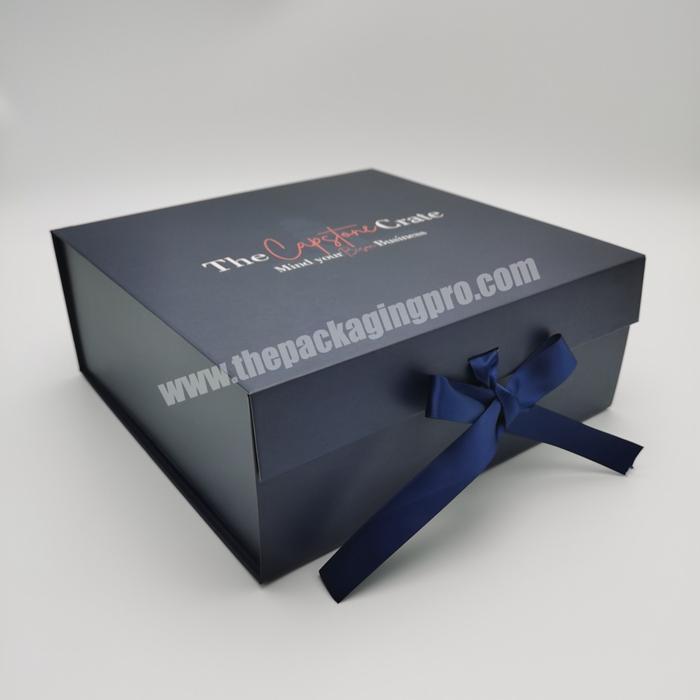 high end gift packaging luxury cardboard rigid subscription box navy blue ribbon magnetic flip gift box