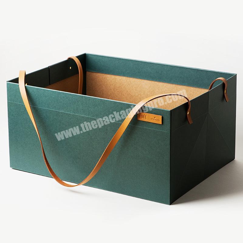Elegant foldable gift packaging with flower packaging leather handle