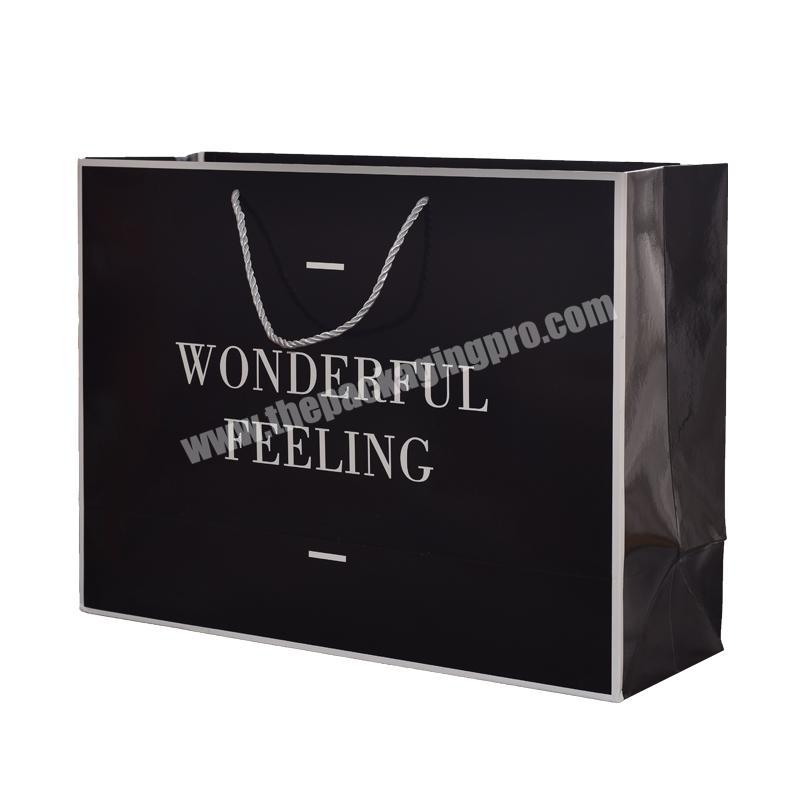 New Gold Logo Hot Foiled Stamping Black Matt Kraft Paper Bag Custom print luxury packaging shopping gift paper bag